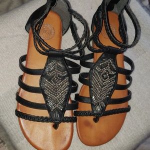 Black studded gladiator style sandals